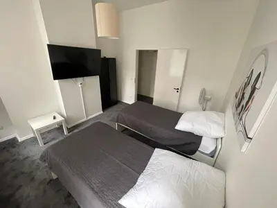 Ein Bett oder Betten in einem Zimmer der Unterkunft Berlinhome Apartment Köpenick