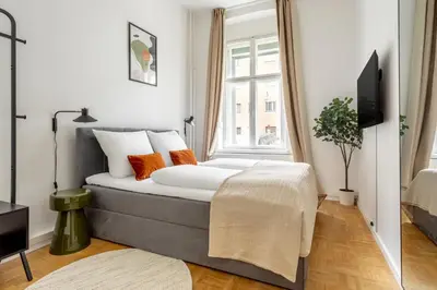 Ein Bett oder Betten in einem Zimmer der Unterkunft Global Living - Design Apartment I Central I Smart-TV I Kitchen I Berlin