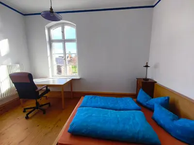 Ein Bett oder Betten in einem Zimmer der Unterkunft Zwei 