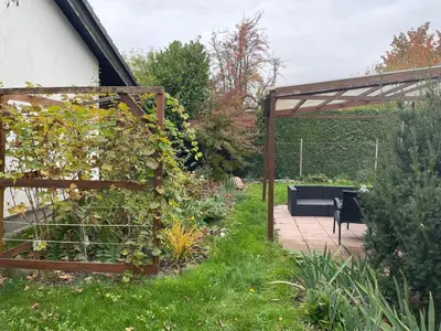 Ein Garten an der Unterkunft Ferienhaus in der Stienitzaue