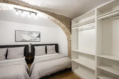 Ein Bett oder Betten in einem Zimmer der Unterkunft Spacious Apartments In Mitte- Feel The Citycenter