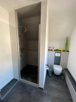 Ein Badezimmer in der Unterkunft Ferienhaus Pusteblume