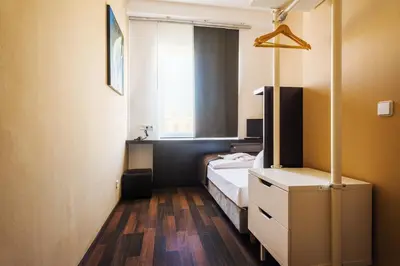 Ein Bett oder Betten in einem Zimmer der Unterkunft Apple City Hotel