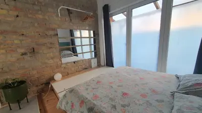 Ein Bett oder Betten in einem Zimmer der Unterkunft Squat Deluxe Berlin, the hostel