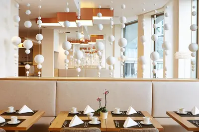 Ein Restaurant oder anderes Speiselokal in der Unterkunft Steigenberger Hotel Am Kanzleramt