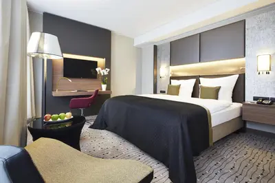 Ein Bett oder Betten in einem Zimmer der Unterkunft Steigenberger Hotel Am Kanzleramt
