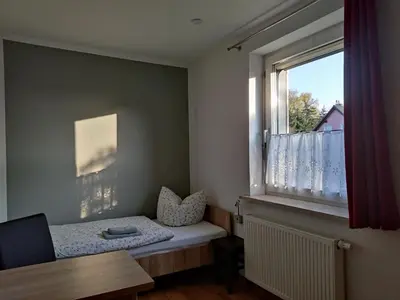 Ein Bett oder Betten in einem Zimmer der Unterkunft Haus Werner