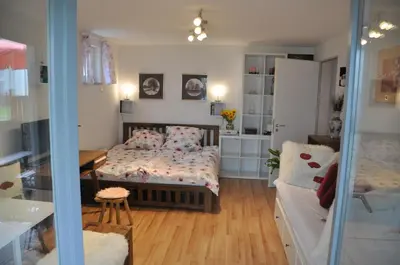 Ein Bett oder Betten in einem Zimmer der Unterkunft TerraceOasisBerlinAirport