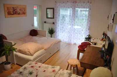Ein Bett oder Betten in einem Zimmer der Unterkunft TerraceOasisBerlinAirport