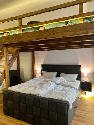 Ein Bett oder Betten in einem Zimmer der Unterkunft Kant 99 XL