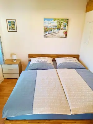 Ein Bett oder Betten in einem Zimmer der Unterkunft Ferienhuette
