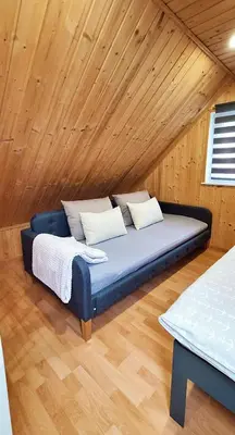 Ein Bett oder Betten in einem Zimmer der Unterkunft Ferienhuette