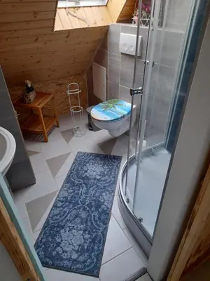Ein Badezimmer in der Unterkunft De´ Borns Ferienwohnung