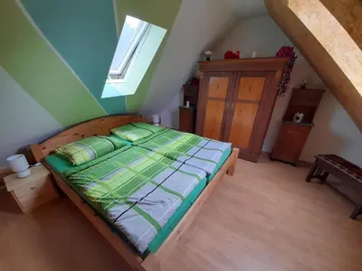 Ein Bett oder Betten in einem Zimmer der Unterkunft De´ Borns Ferienwohnung