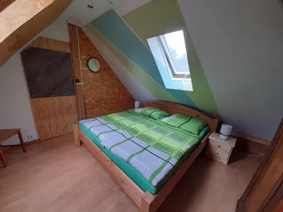 Ein Bett oder Betten in einem Zimmer der Unterkunft De´ Borns Ferienwohnung