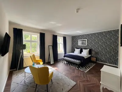 Ein Bett oder Betten in einem Zimmer der Unterkunft Schlosshotel Rheinsberg