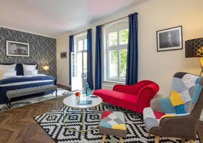 Ein Bett oder Betten in einem Zimmer der Unterkunft Schlosshotel Rheinsberg