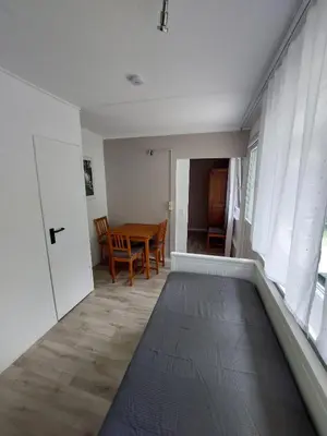 Ein Sitzbereich in der Unterkunft Ferienbungalows am Wolziger See