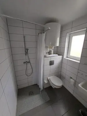 Ein Badezimmer in der Unterkunft Ferienbungalows am Wolziger See