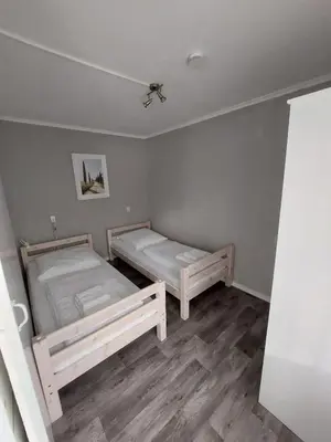 Ein Bett oder Betten in einem Zimmer der Unterkunft Ferienbungalows am Wolziger See