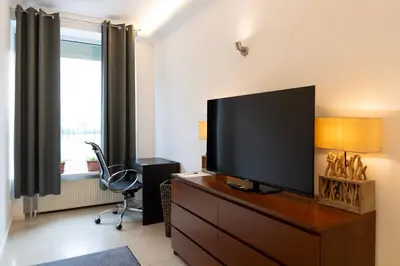 TV/Unterhaltungsangebot in der Unterkunft FRAME by Comfort Housing - spacious apartment