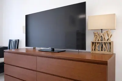 TV/Unterhaltungsangebot in der Unterkunft FRAME by Comfort Housing - spacious apartment