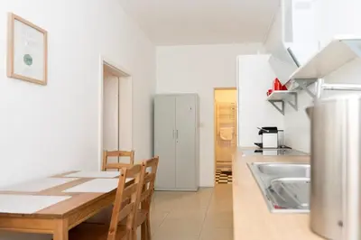 Küche/Küchenzeile in der Unterkunft FRAME by Comfort Housing - spacious apartment