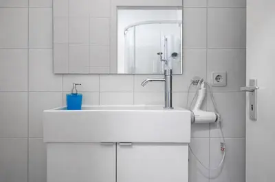 Ein Badezimmer in der Unterkunft FRAME by Comfort Housing - spacious apartment