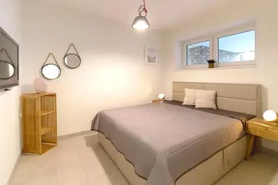 Ein Bett oder Betten in einem Zimmer der Unterkunft Apartmenthaus Scharmützelsee inkl Nebenkosten