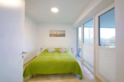 Ein Bett oder Betten in einem Zimmer der Unterkunft Apartmenthaus Scharmützelsee inkl Nebenkosten
