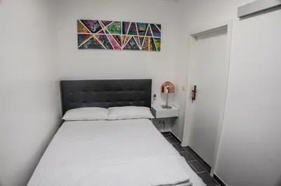 Ein Bett oder Betten in einem Zimmer der Unterkunft One Way Apartment