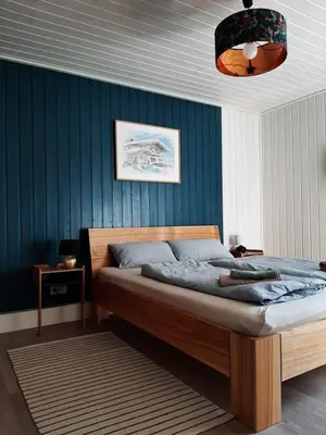 Ein Bett oder Betten in einem Zimmer der Unterkunft Annemarie Zerpenschleuse - Schwedenhaus mit Künstler-Charme und Sauna