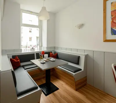 Ein Sitzbereich in der Unterkunft City Hotel-Pension Brandenburg