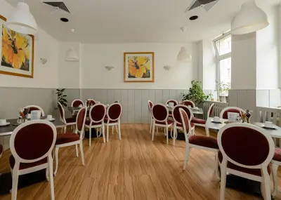 Ein Sitzbereich in der Unterkunft City Hotel-Pension Brandenburg