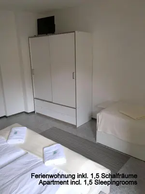 Ein Bett oder Betten in einem Zimmer der Unterkunft City Hotel-Pension Brandenburg