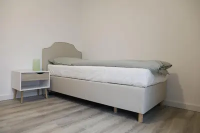 Ein Bett oder Betten in einem Zimmer der Unterkunft Gästehaus Bernau OT Schönow