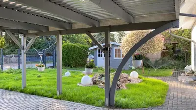 Ein Garten an der Unterkunft Stay Inn by Pearl - 2 Schlafzimmer - S-Bahn - Parkplatz - Immanuel Krankenhaus - Helios Klinikum