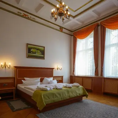 Ein Bett oder Betten in einem Zimmer der Unterkunft Hotel Seeschlösschen