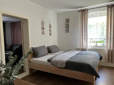 Ein Bett oder Betten in einem Zimmer der Unterkunft Ferienwohnung Nauen Familie Renner