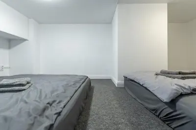 Ein Bett oder Betten in einem Zimmer der Unterkunft Spacious Lofts In Wedding