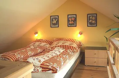 Ein Bett oder Betten in einem Zimmer der Unterkunft Anno-Nostalgia