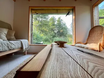 Ein Bett oder Betten in einem Zimmer der Unterkunft Häuschen in den Erlen