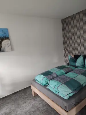Ein Bett oder Betten in einem Zimmer der Unterkunft FeWo Franja Angermünde
