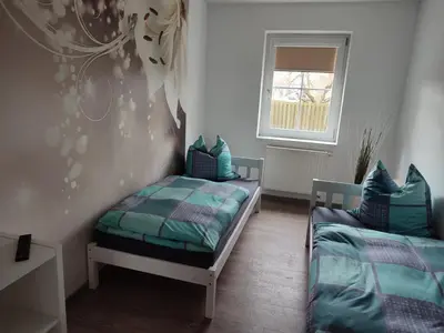 Ein Bett oder Betten in einem Zimmer der Unterkunft FeWo Franja Angermünde