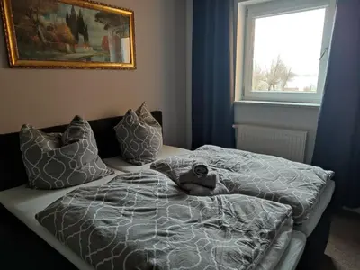Ein Bett oder Betten in einem Zimmer der Unterkunft FeWo Franja Angermünde
