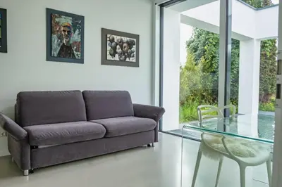 Ein Sitzbereich in der Unterkunft Haus am See Storkow