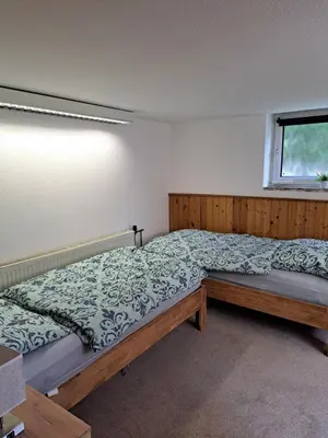 Ein Bett oder Betten in einem Zimmer der Unterkunft Apartment Kastanienallee Rosenthal