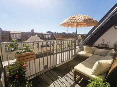 Ein Balkon oder eine Terrasse in der Unterkunft Penthouse + 2 balconies & terrace