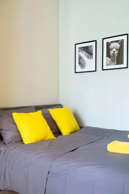 Ein Bett oder Betten in einem Zimmer der Unterkunft Great Apartment close to Kudamm