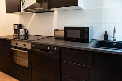 Küche/Küchenzeile in der Unterkunft Modern 2 Bedroom Apartment in Berlin Schöneberg